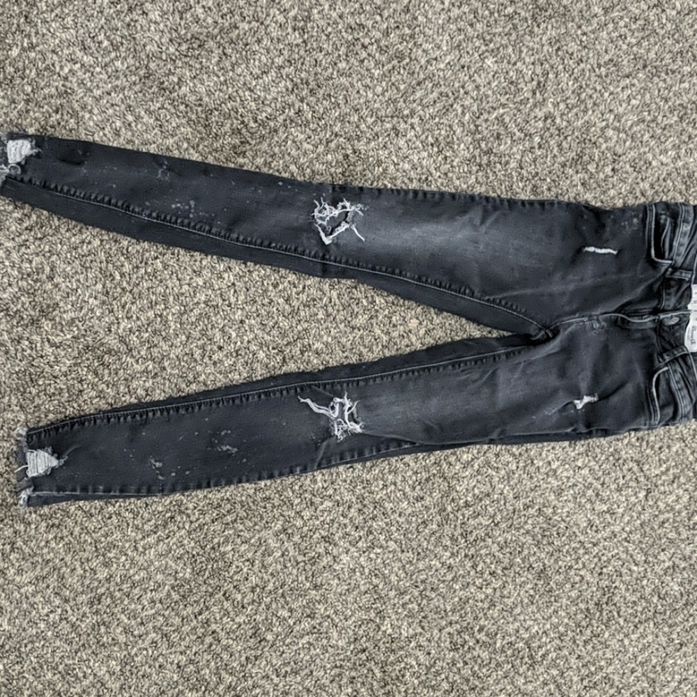 Ripped black skinny jeans